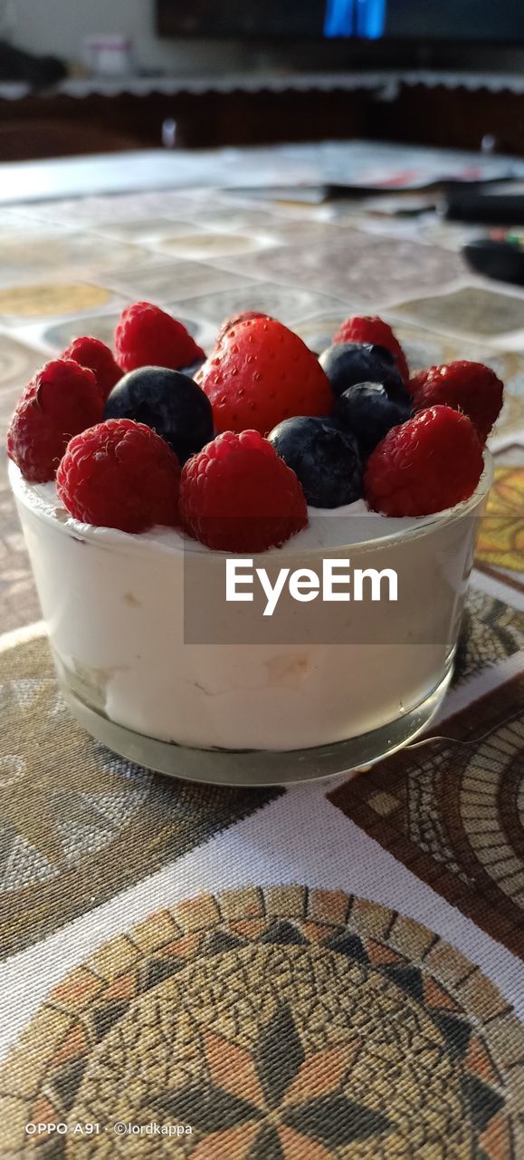 food, food and drink, fruit, berry, healthy eating, freshness, sweet food, dessert, produce, breakfast, meal, sweet, no people, raspberry, pavlova, strawberry, table, dish, wellbeing, indoors, still life, red, close-up, cake, dairy, bowl, sweetness