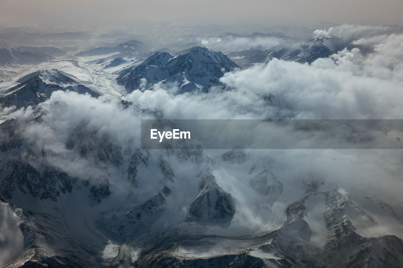 panoramic view of snowcapped mountains against sky