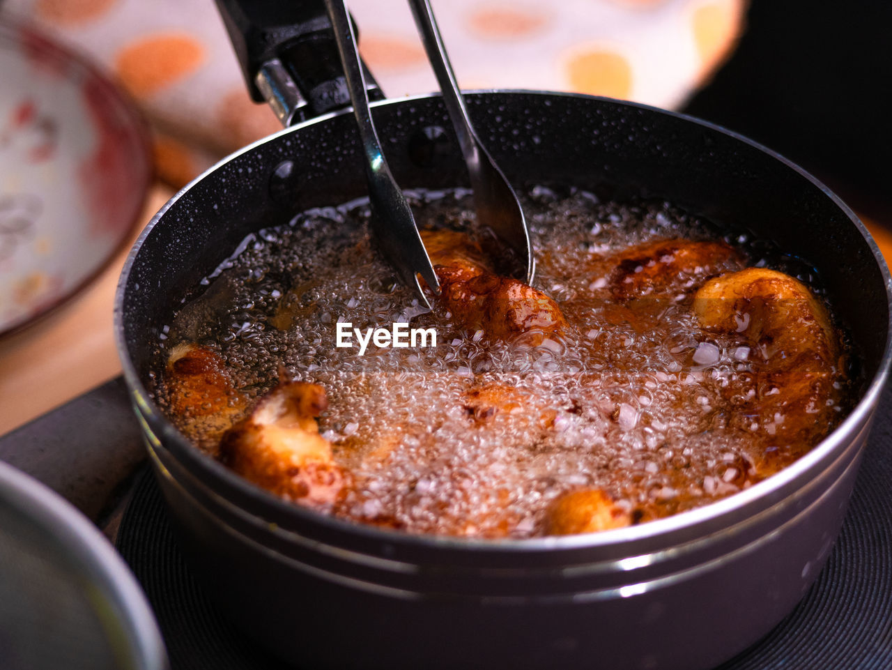 High angle view of meat in cooking pan