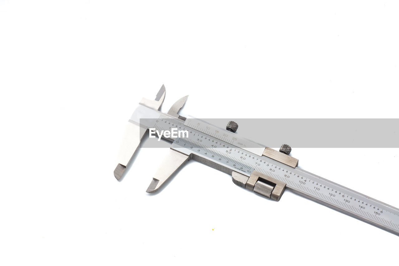 High angle view of ruler on white background