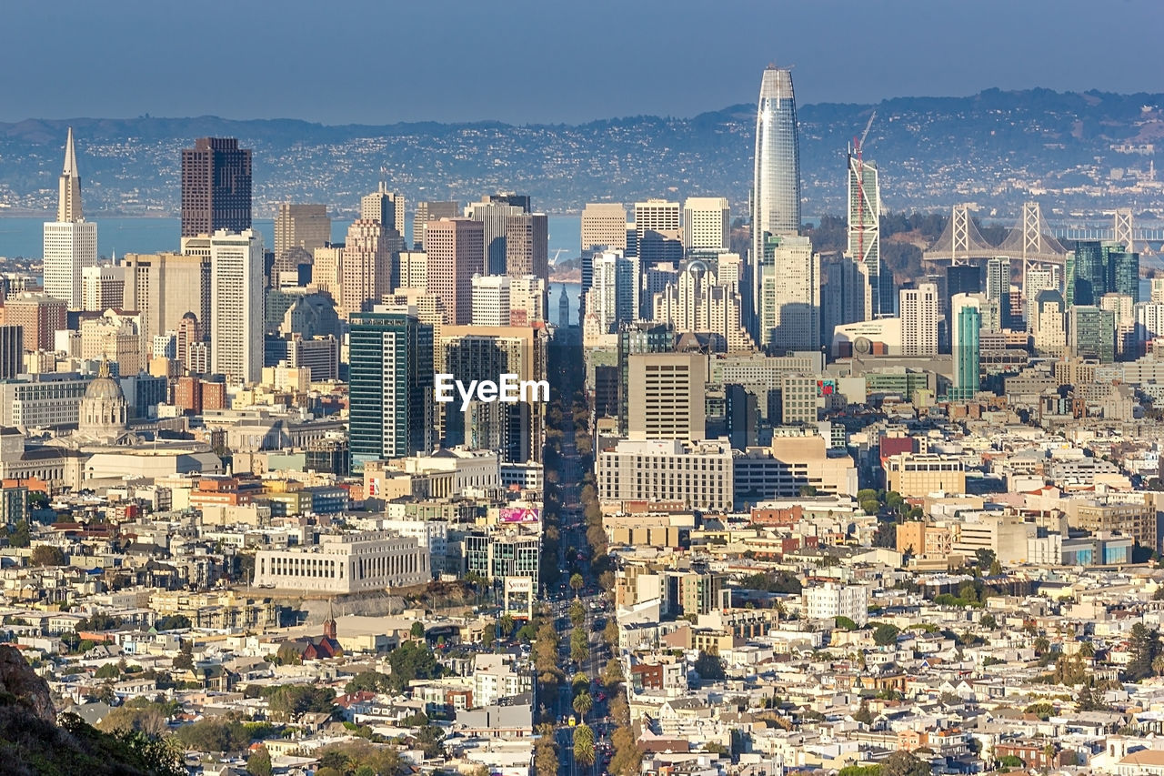 Aerial view of cityscape against sky