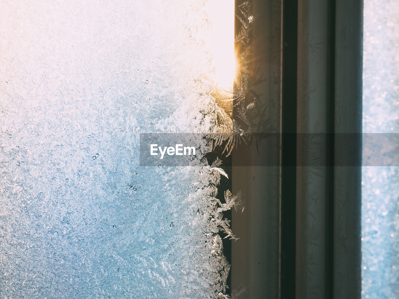 Close-up of frozen glass window