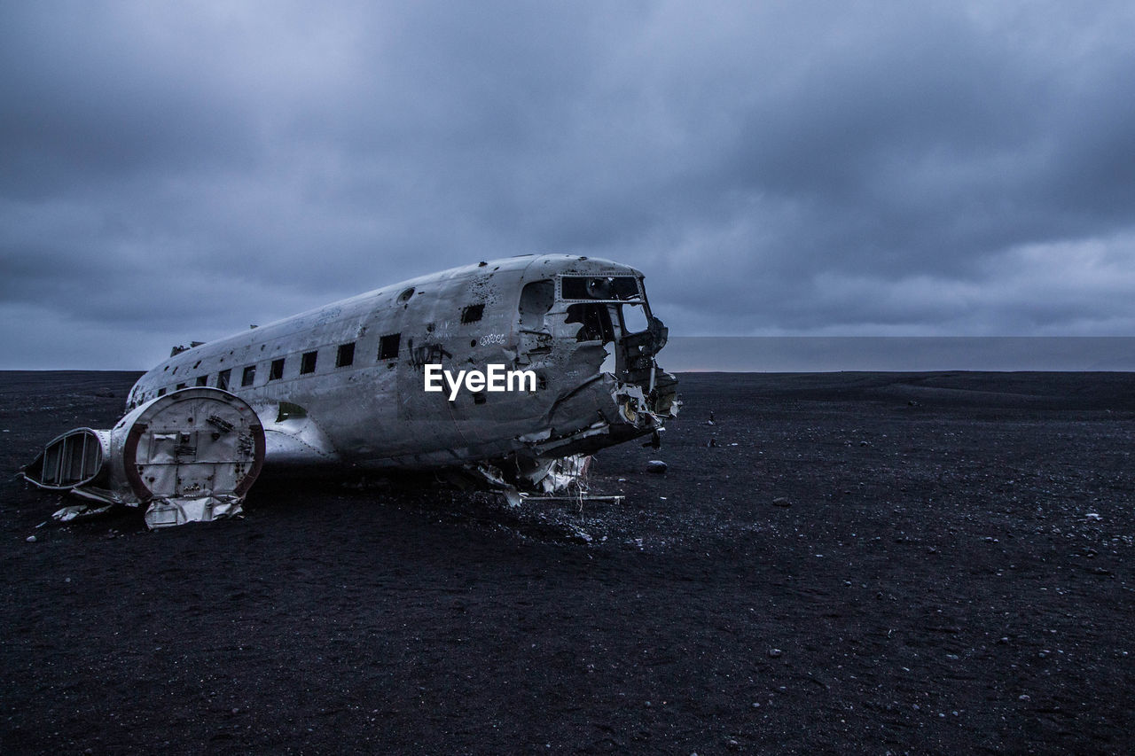 ABANDONED AIRPLANE ON BEACH