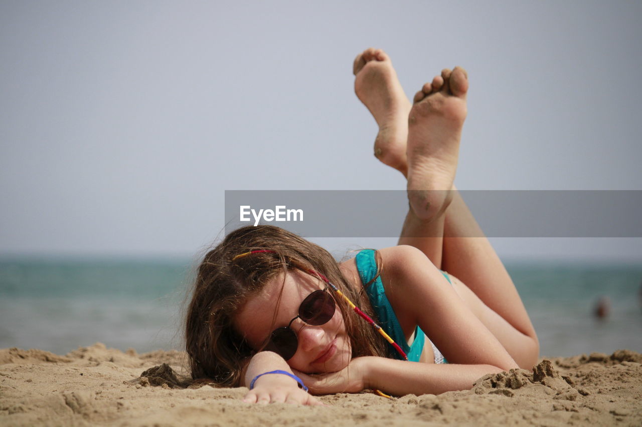 Portrait of young woman on beach