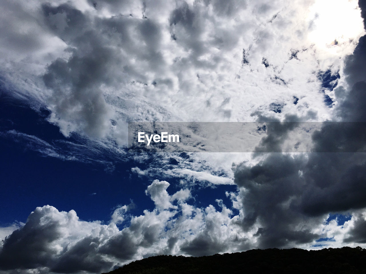 LOW ANGLE VIEW OF CLOUDS AGAINST SKY