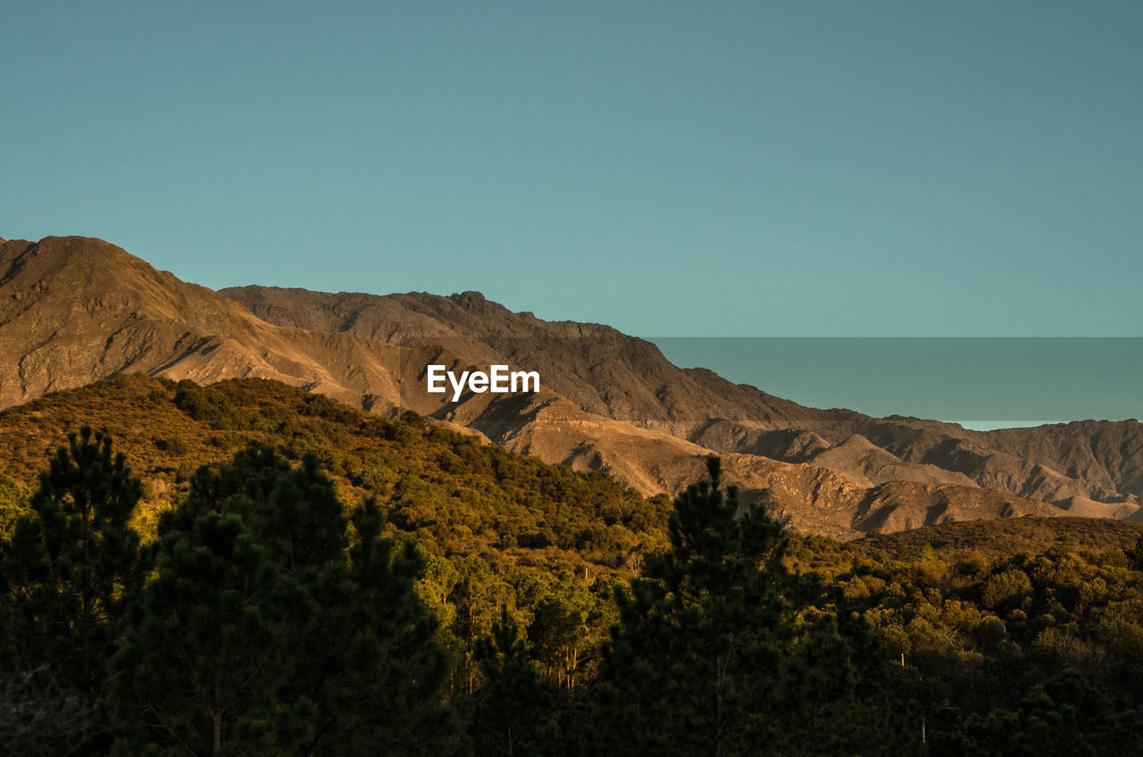 Scenic view of mountains against clear sky