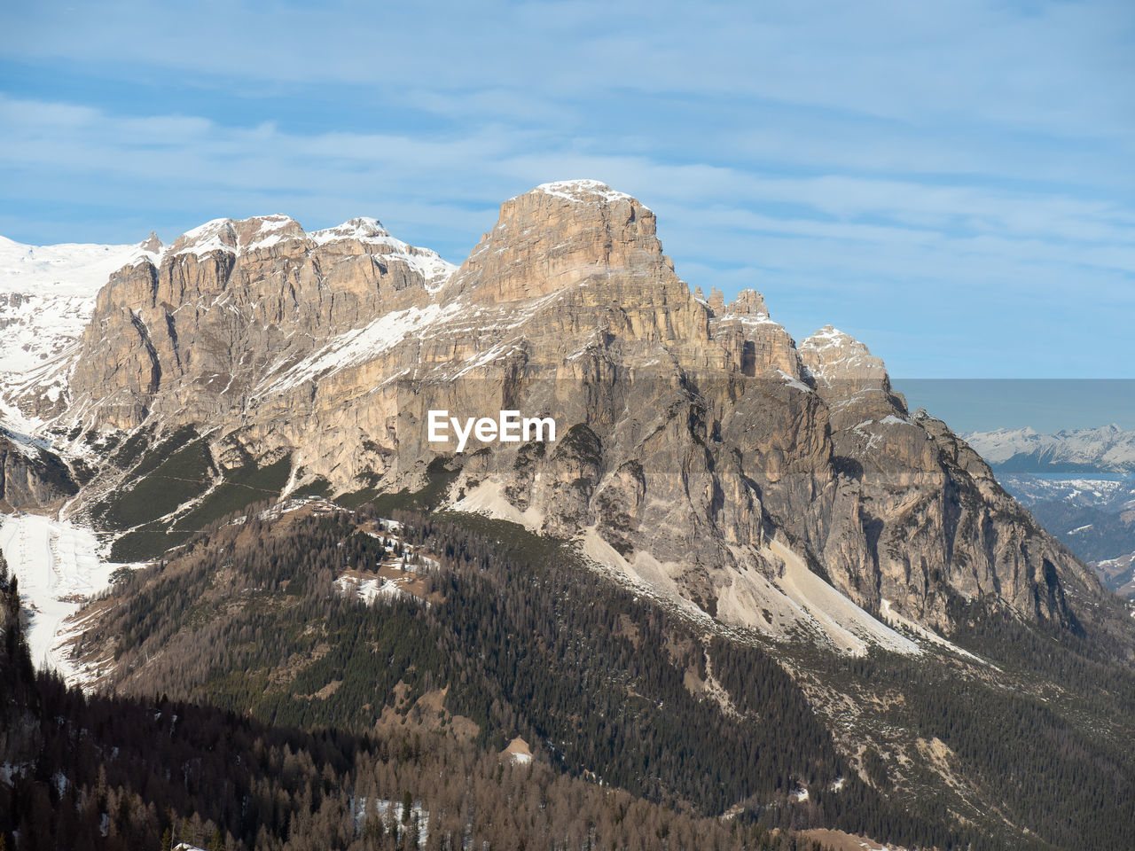 mountain, scenics - nature, beauty in nature, mountain range, sky, environment, landscape, nature, snow, cloud, wilderness, tranquil scene, no people, cold temperature, rock, land, tranquility, ridge, winter, non-urban scene, day, travel destinations, travel, snowcapped mountain, plateau, mountain peak, outdoors, adventure, idyllic, plant, physical geography, summit, extreme terrain, remote, tourism, tree, rock formation, geology, mountain pass