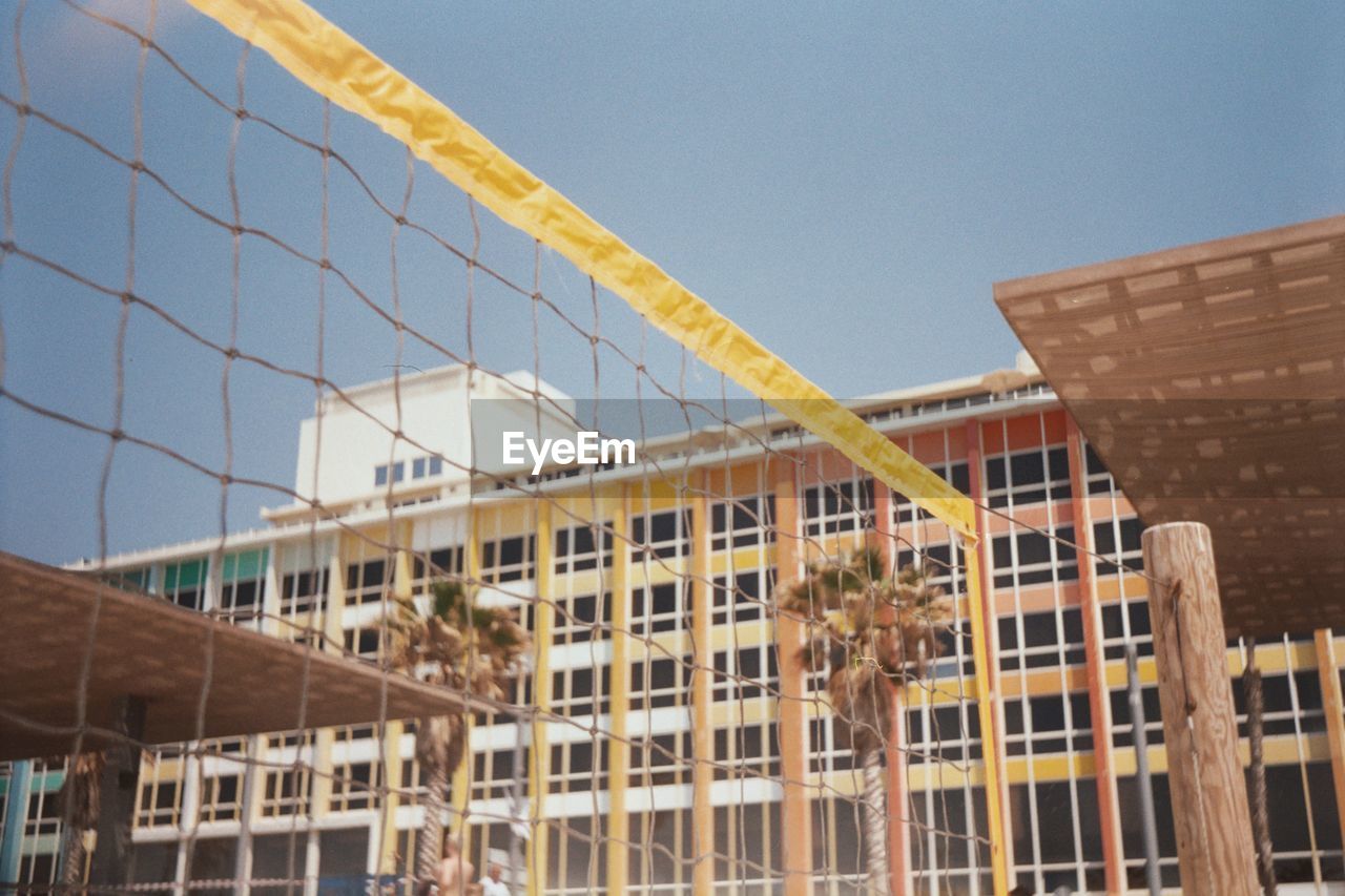 Low angle view of net against building