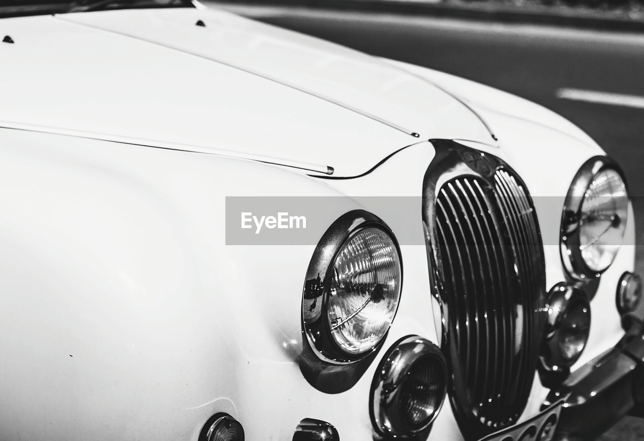 Cropped image of white vintage car