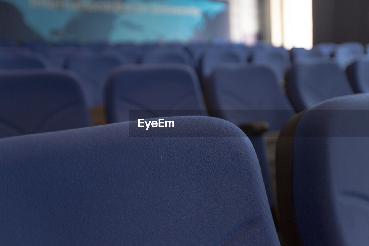 CLOSE-UP OF EMPTY SEATS IN BUS