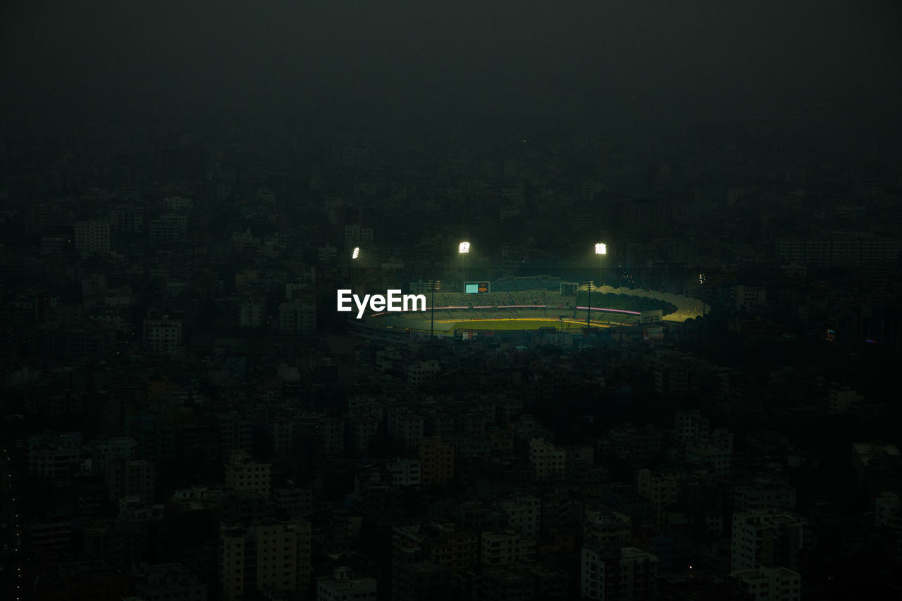 Illuminated stadium at night