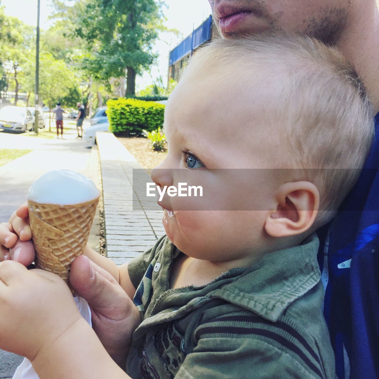 WOMAN HOLDING ICE CREAM