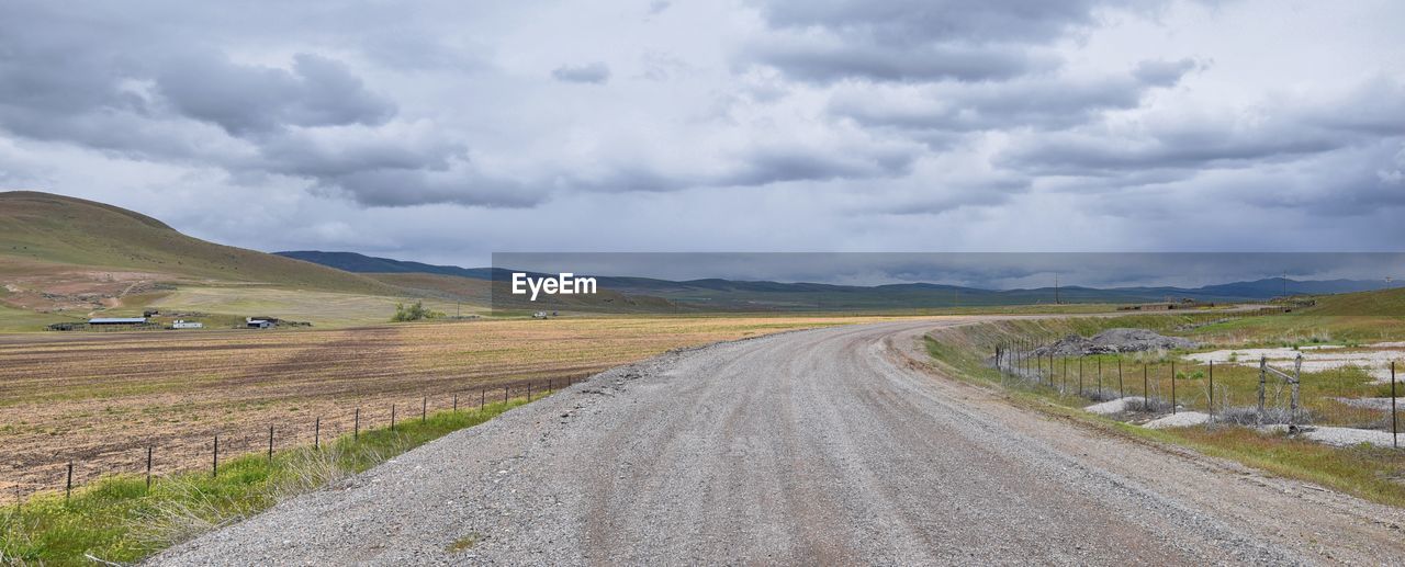 Sheep grazing utah idaho from i-84 rural farming land in the rocky mountains. united states.