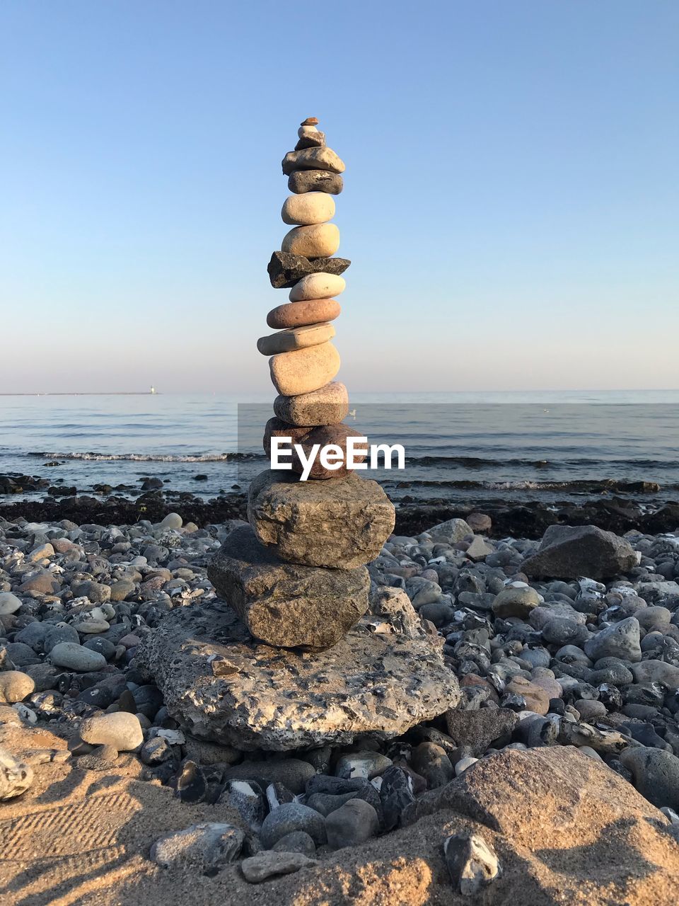 STACK OF STONES ON BEACH