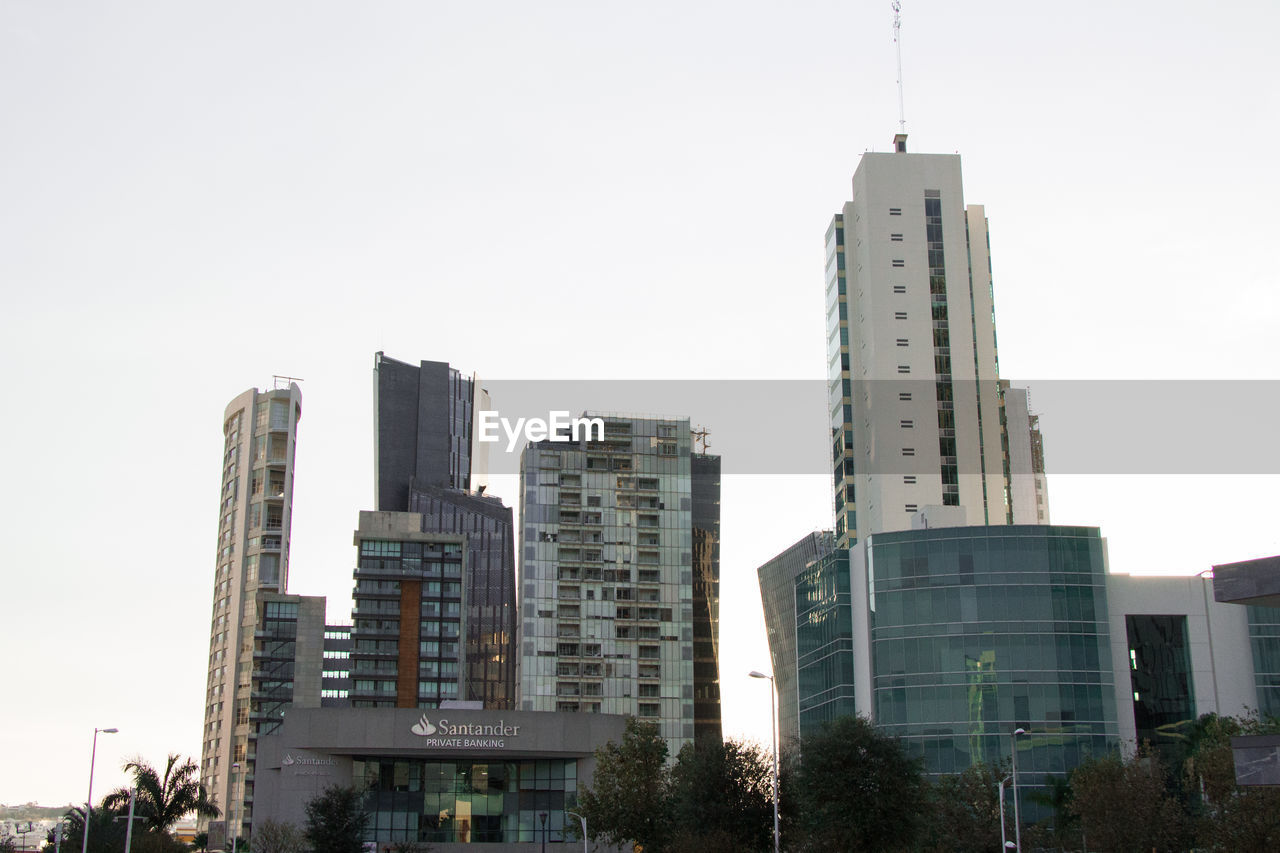 VIEW OF SKYSCRAPERS AGAINST CLEAR SKY