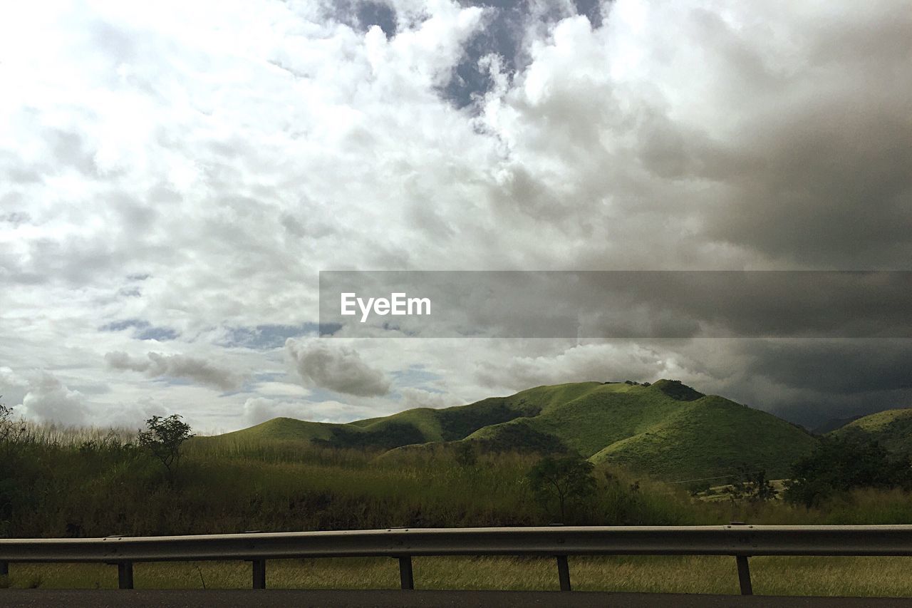 nature, cloud - sky, scenics, tree, beauty in nature, no people, tranquility, landscape, tranquil scene, day, sky, animal themes, outdoors, mountain, water