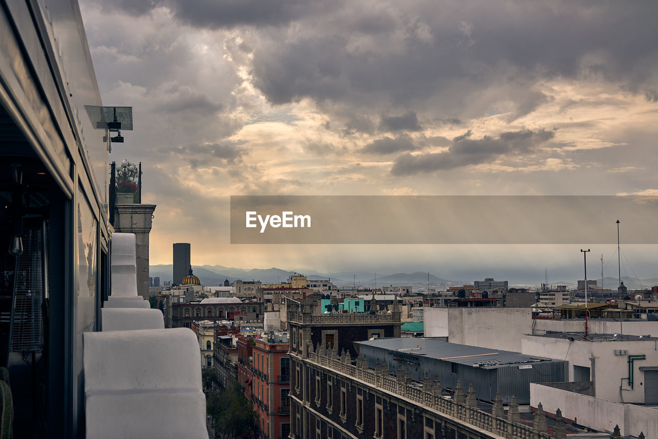 High angle view of buildings in méxico city against sky during sunset