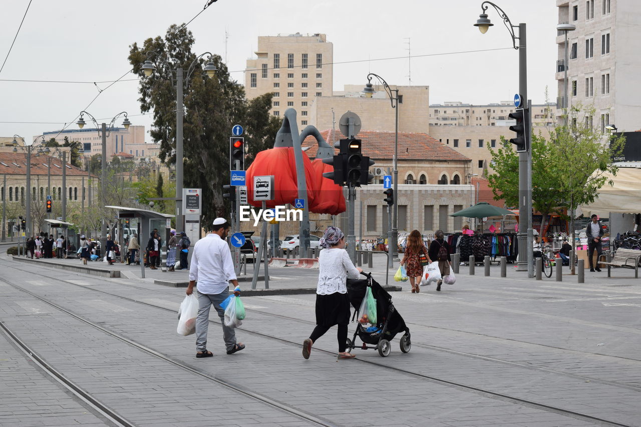 PEOPLE WALKING ON STREET