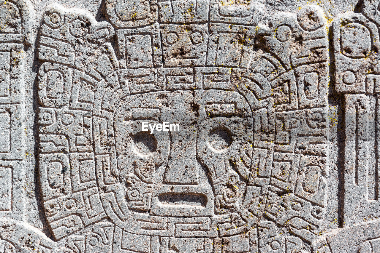Face carved on tiwanaku old ruin