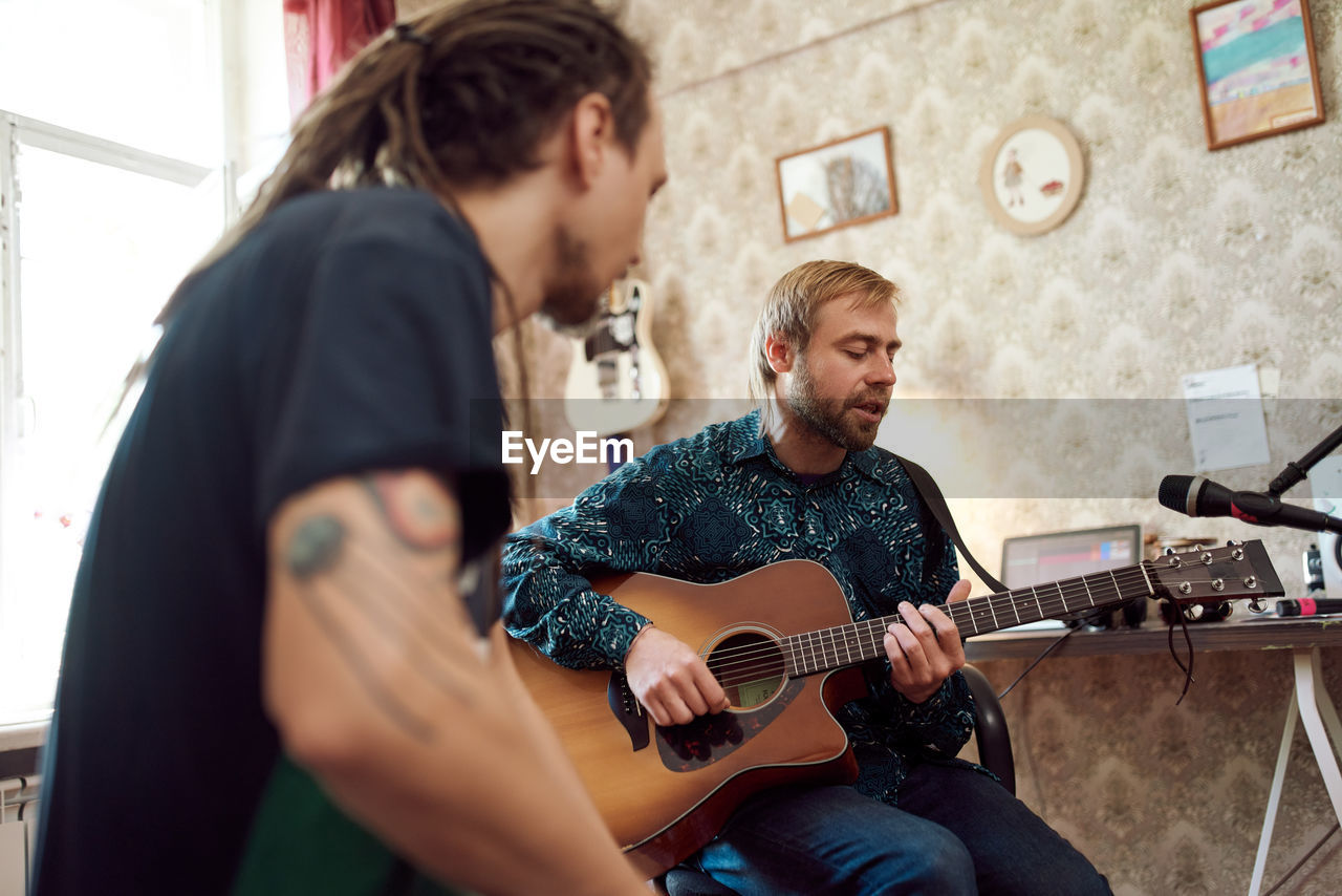 Young man playing guitar