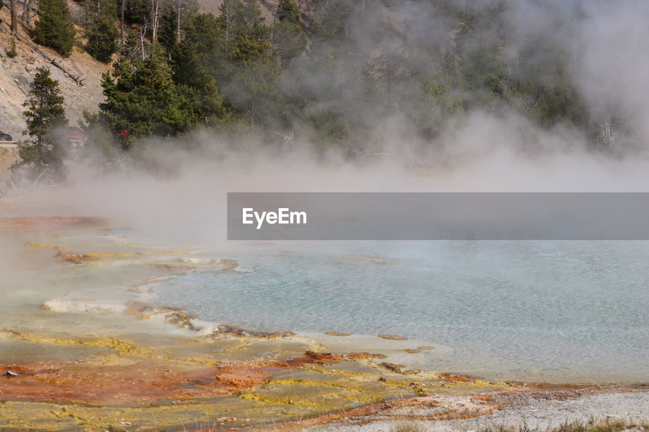 Scenic view of natural hot spring