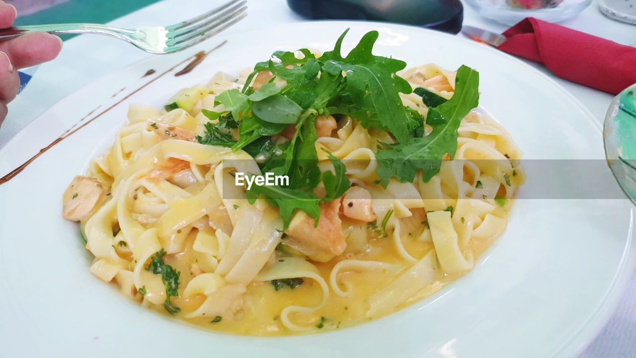 High angle view of pasta in plate on table