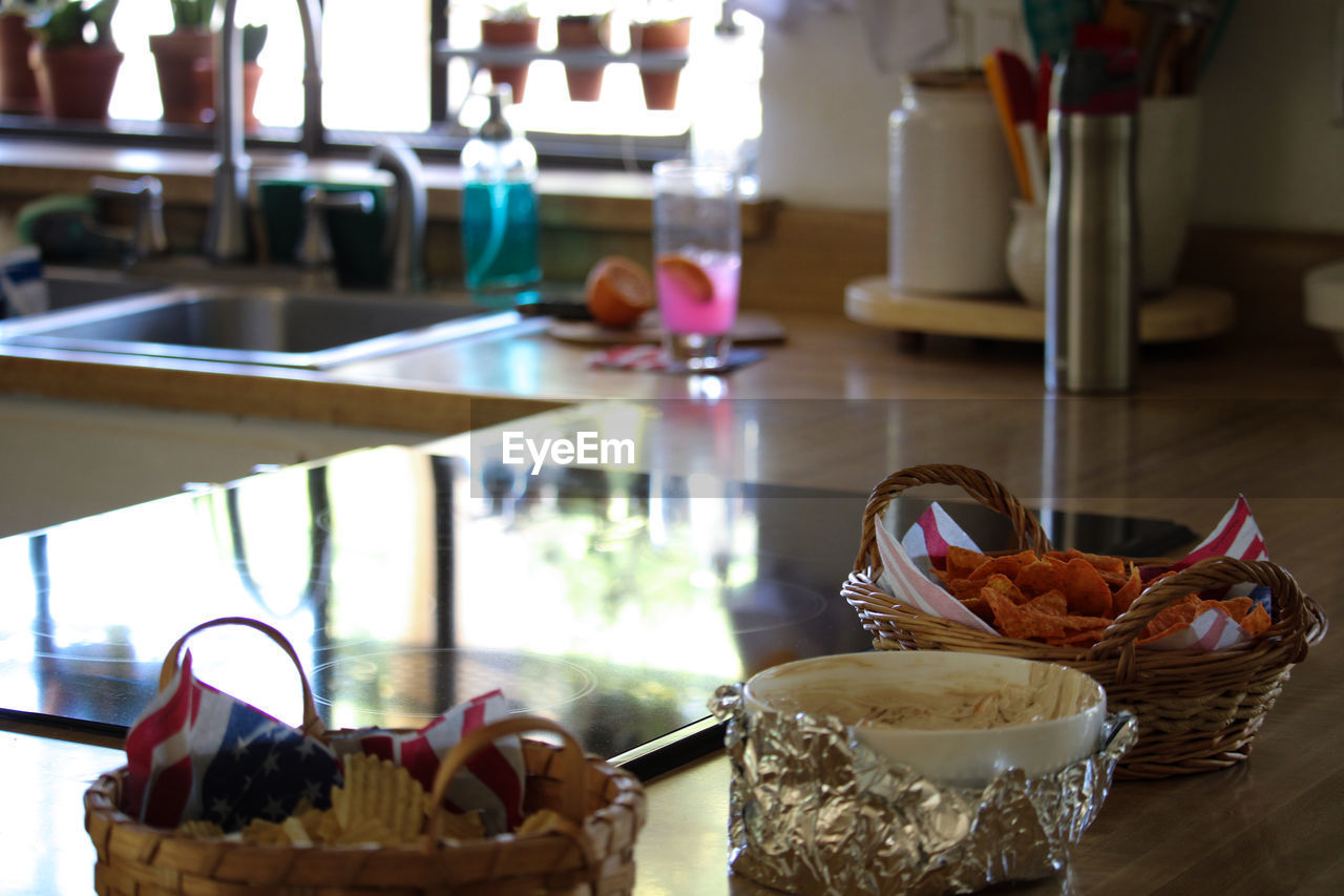 CLOSE-UP OF DRINK ON TABLE