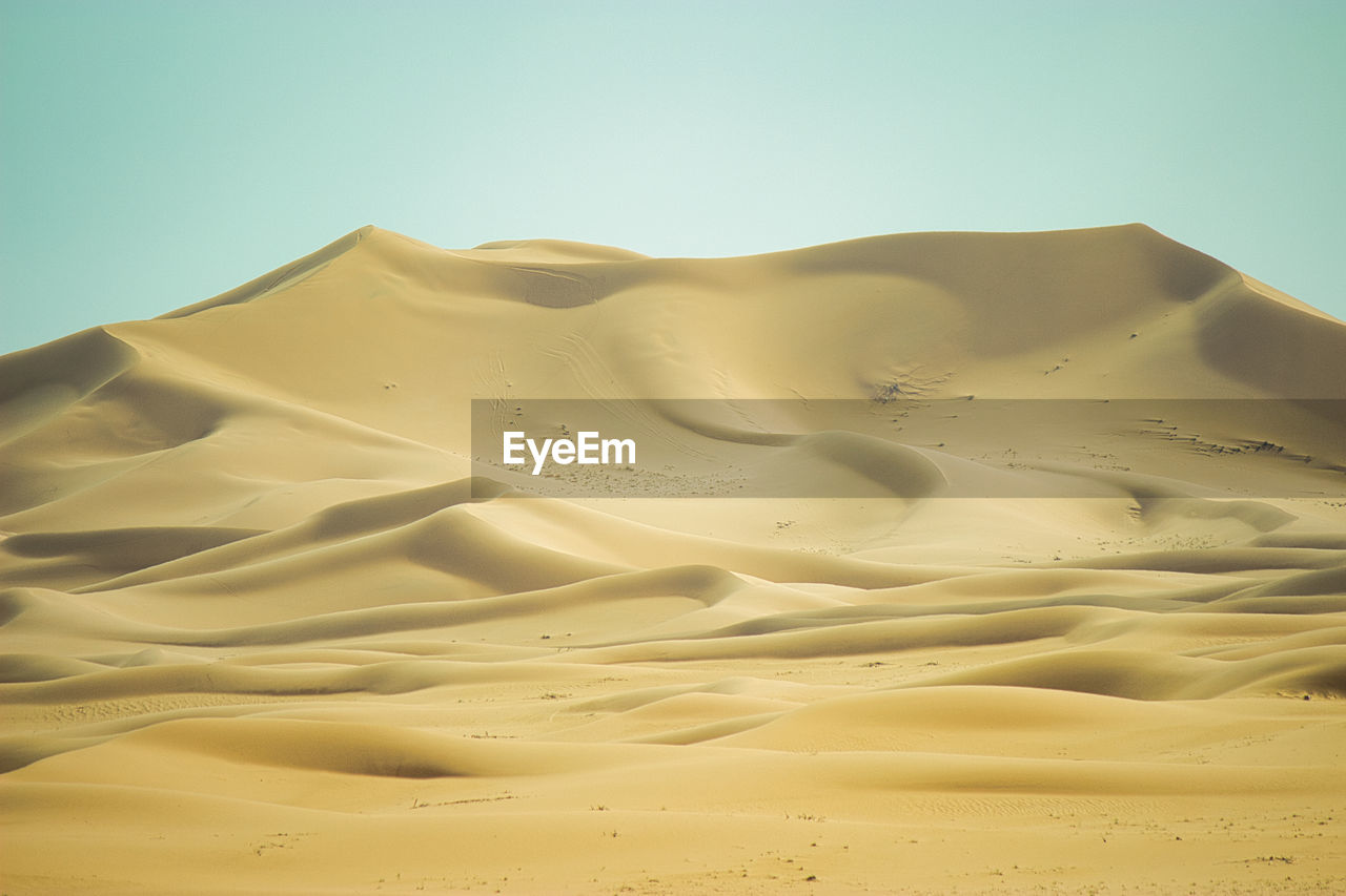 scenic view of desert against sky
