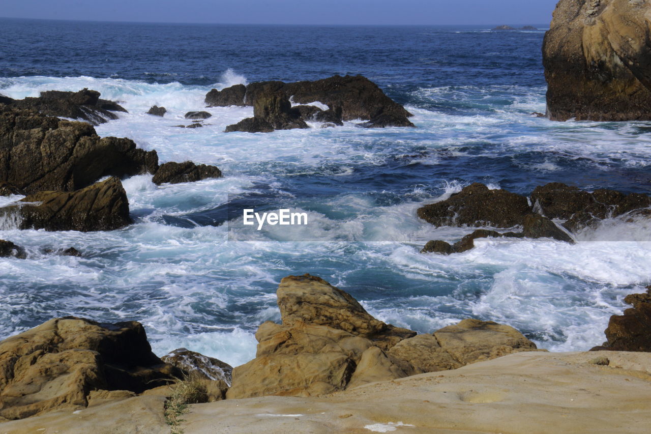 Scenic view of rocks and sea