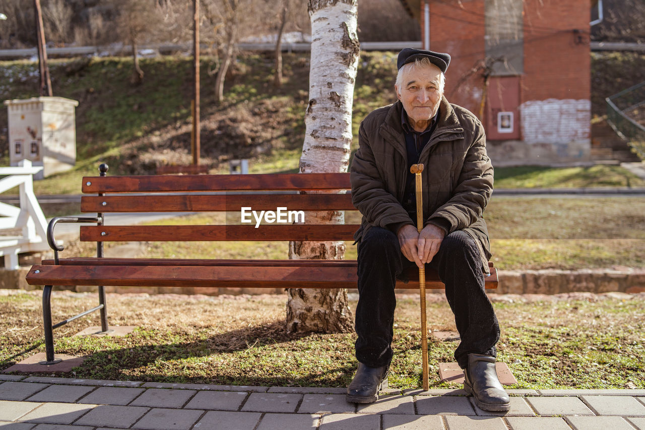 Senior man sitting on bench