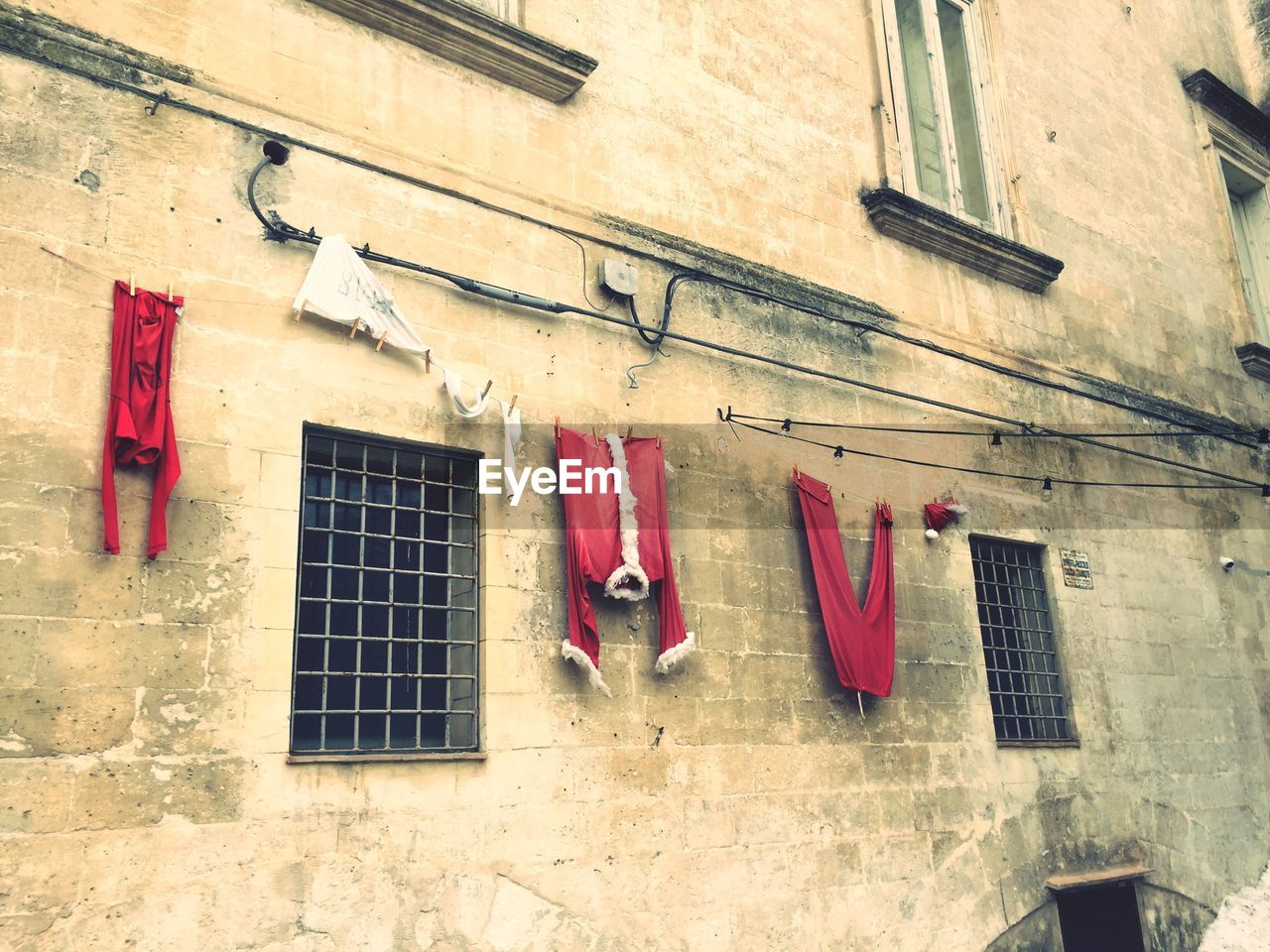 CLOTHES DRYING AGAINST BUILDING