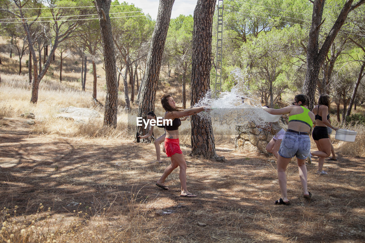 People playing in forest