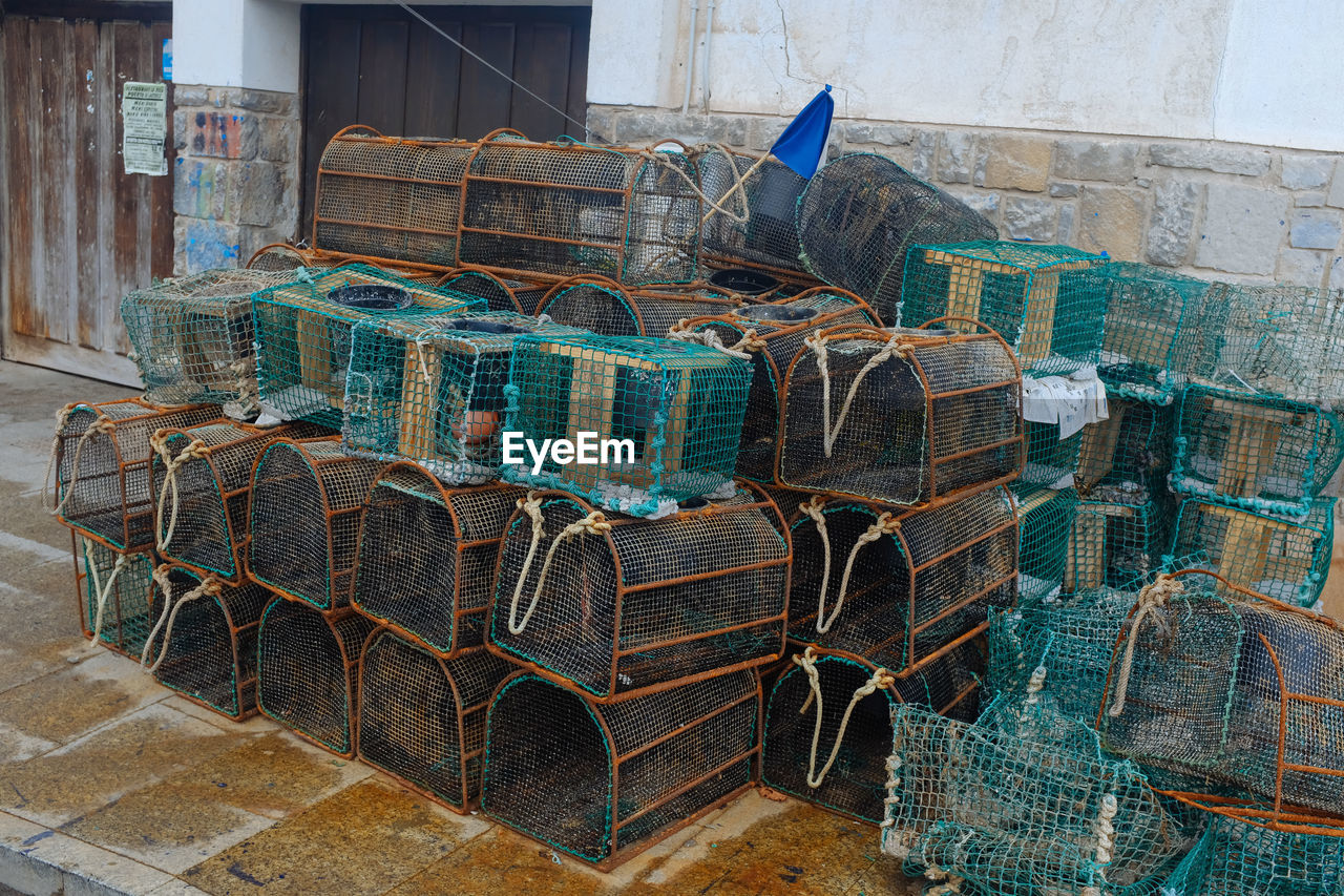 High angle view of cages against wall