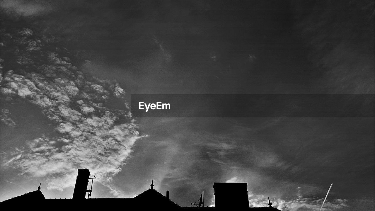 Silhouette of roofs and chimneys