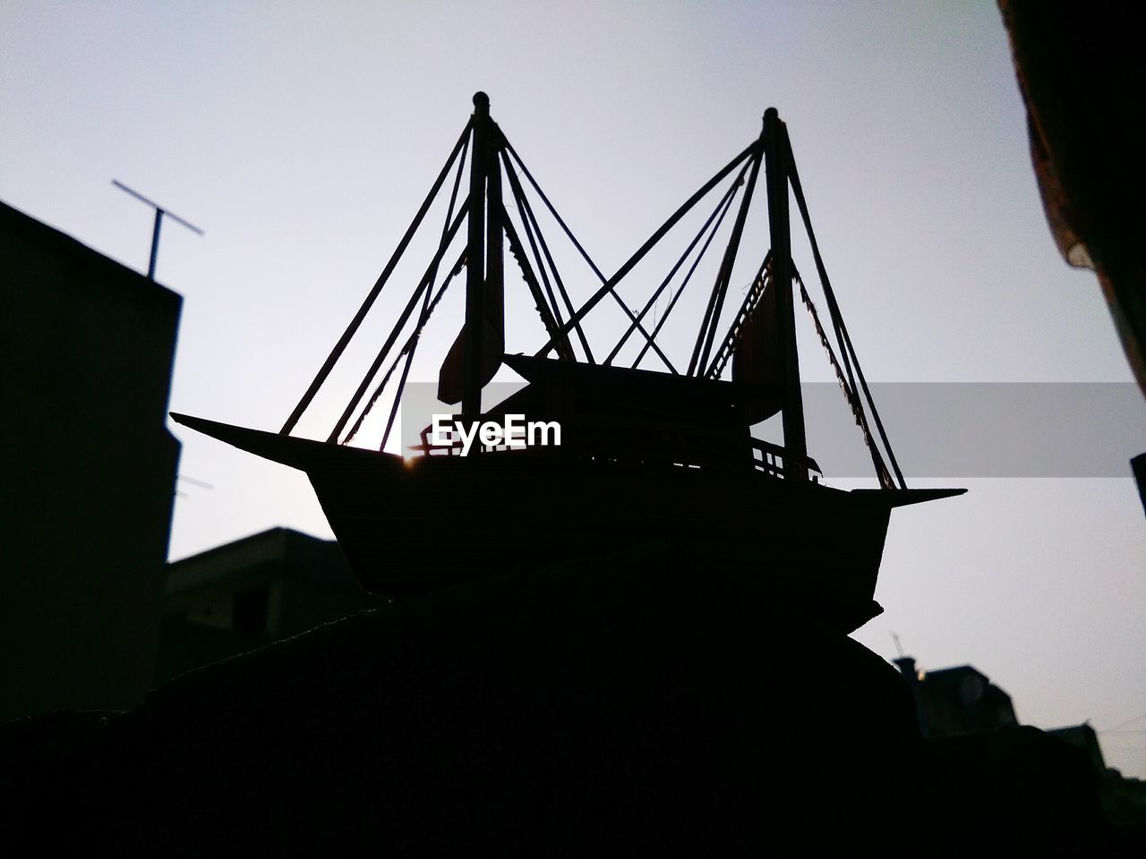 LOW ANGLE VIEW OF SILHOUETTE SHIP AGAINST SKY