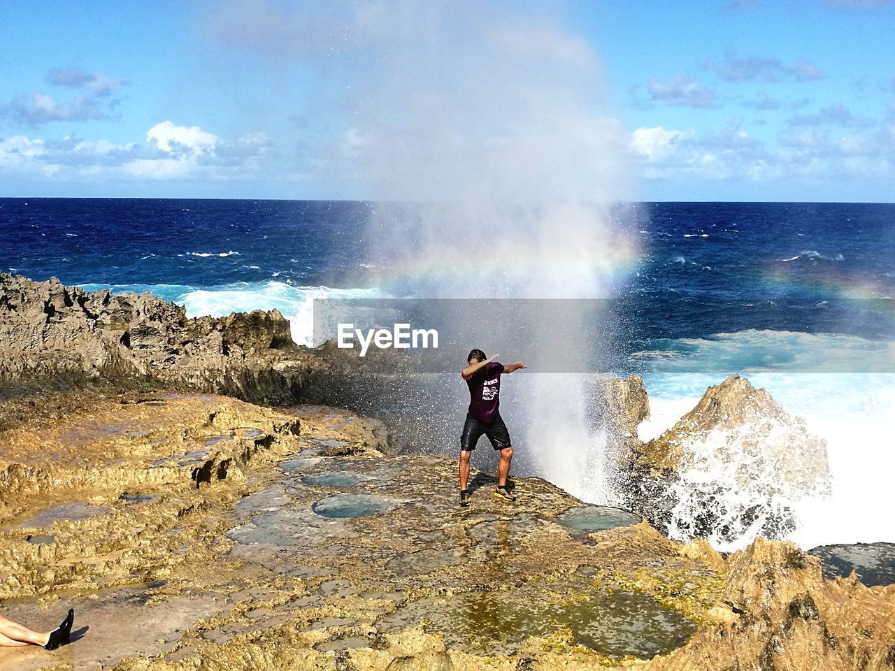 FULL LENGTH OF MAN ON BEACH