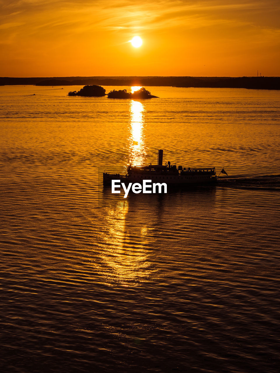 Scenic view of sea at sunset