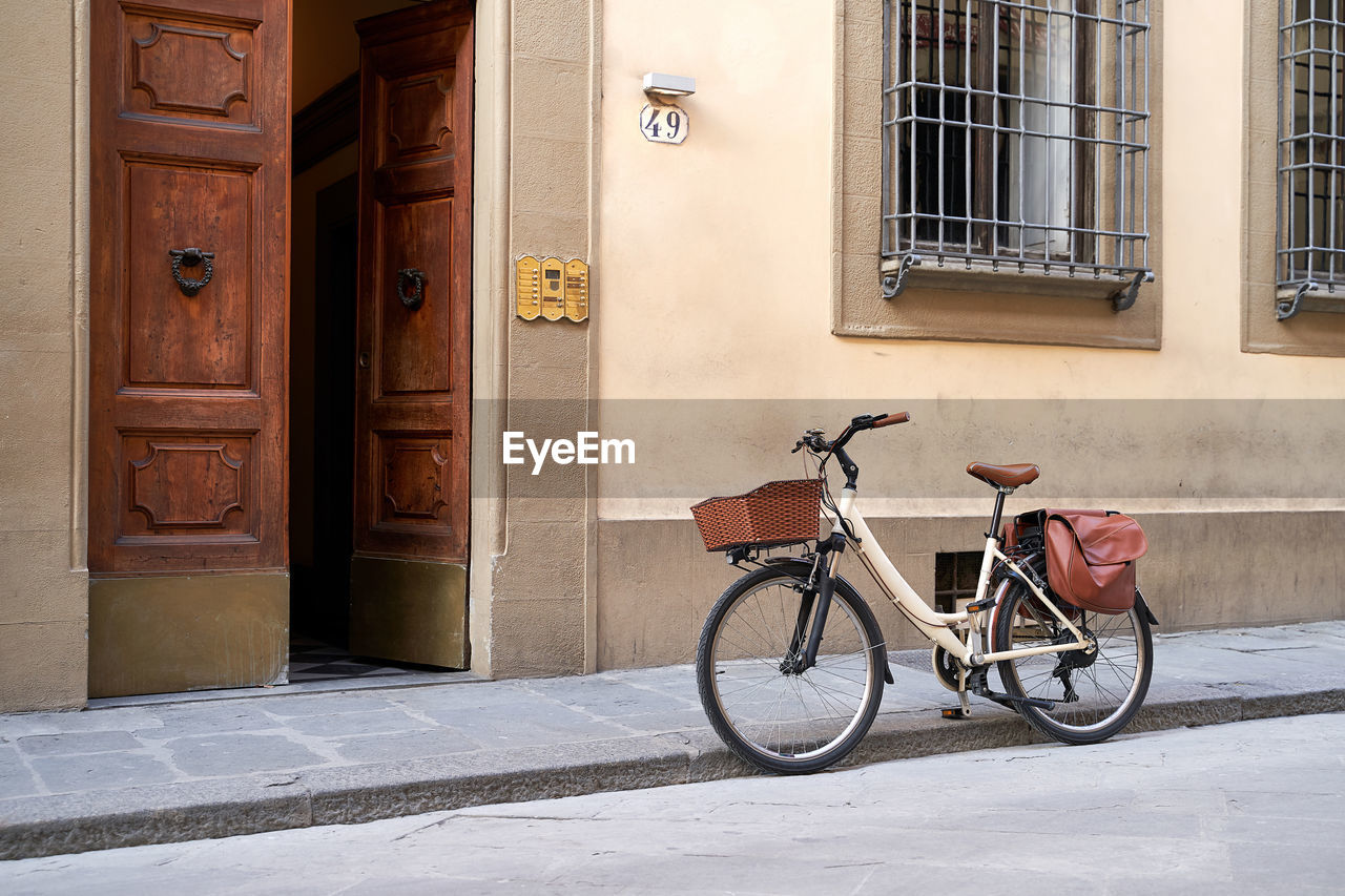 bicycle parked on wall