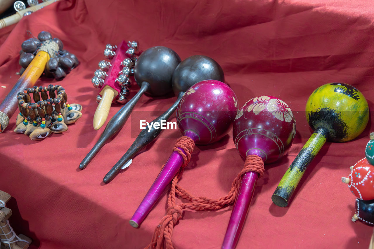 no people, high angle view, indoors, multi colored, large group of objects, red, still life, toy