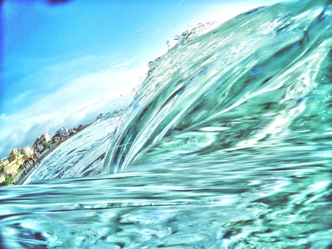 CLOSE-UP OF WAVE AGAINST SEA