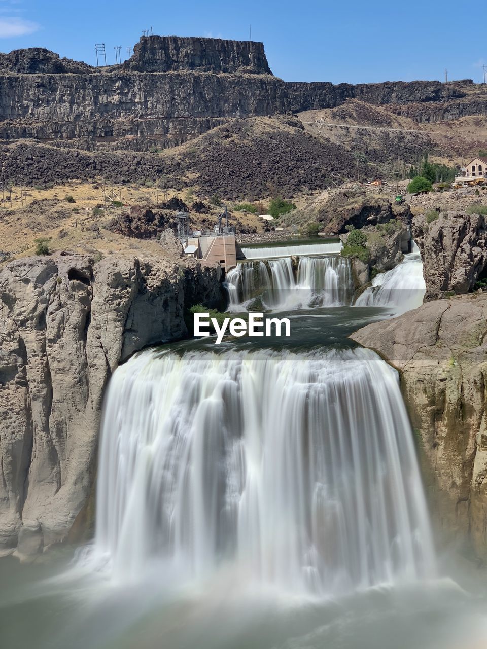 VIEW OF WATERFALL IN ROCKS