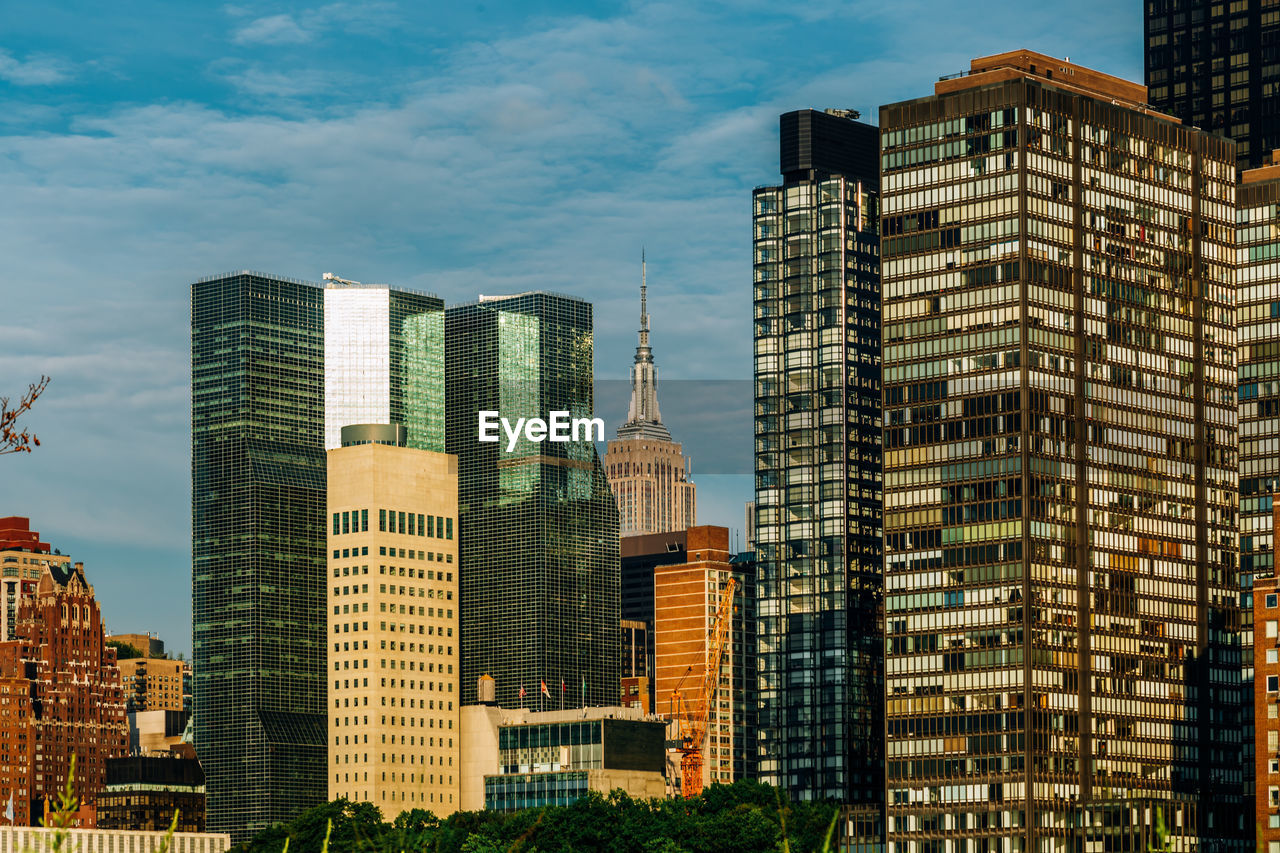 Low angle view of buildings against sky in city