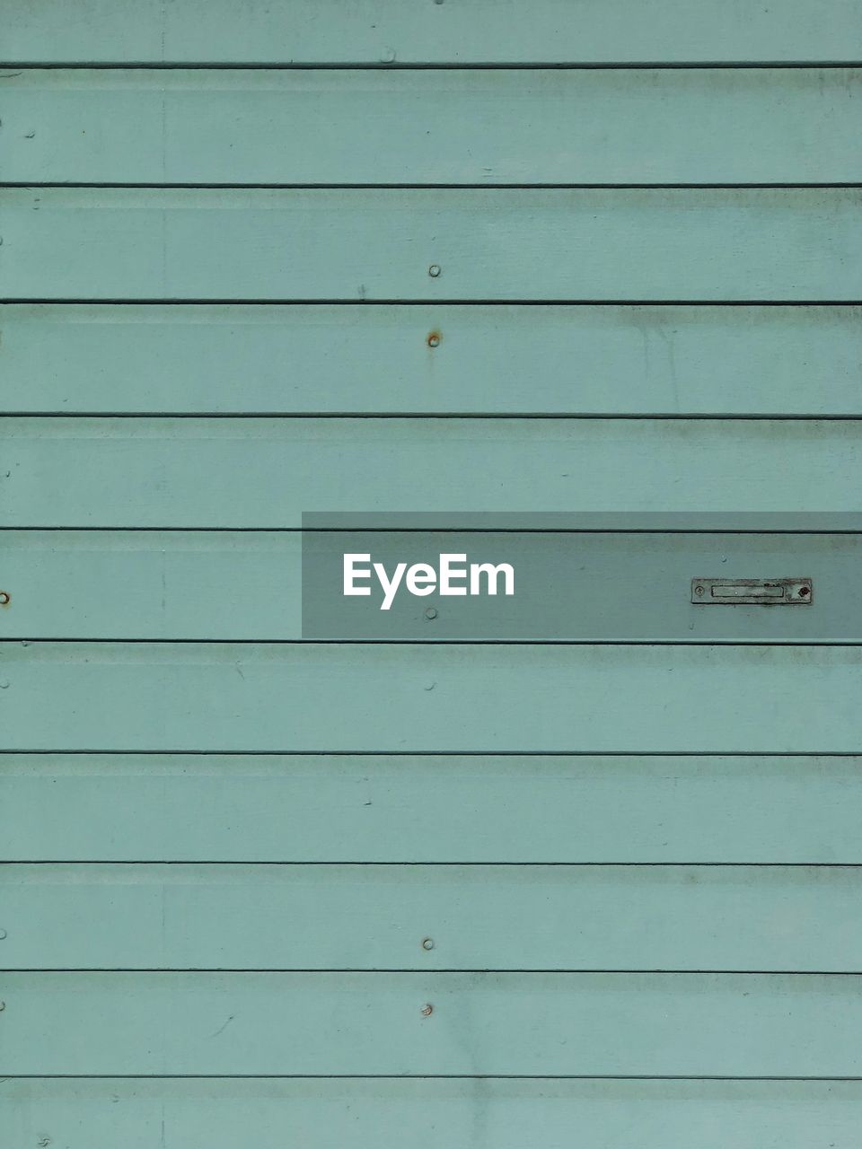 FULL FRAME SHOT OF SHUTTER WITH CLOSED DOOR