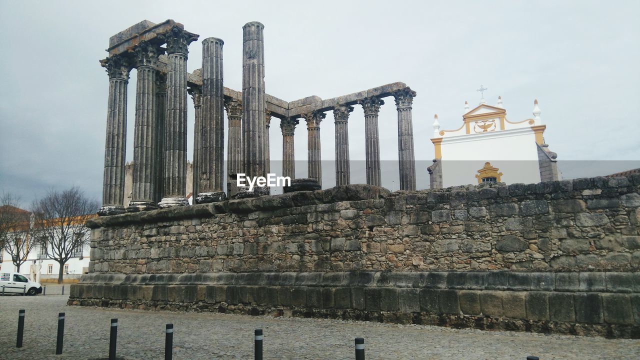 Low angle view of temple of artemis against sky