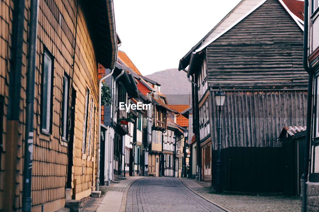 Narrow alley along buildings