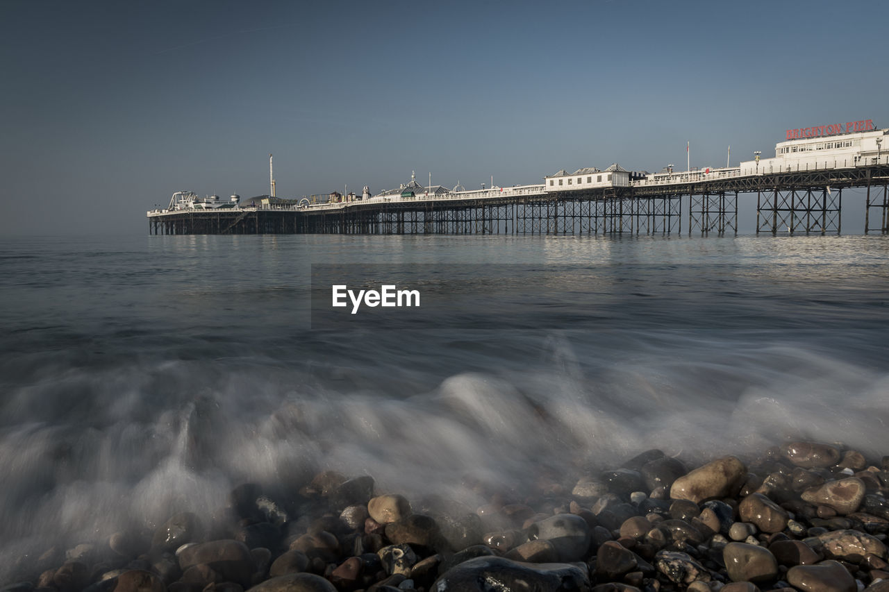 View of bridge over sea against sky