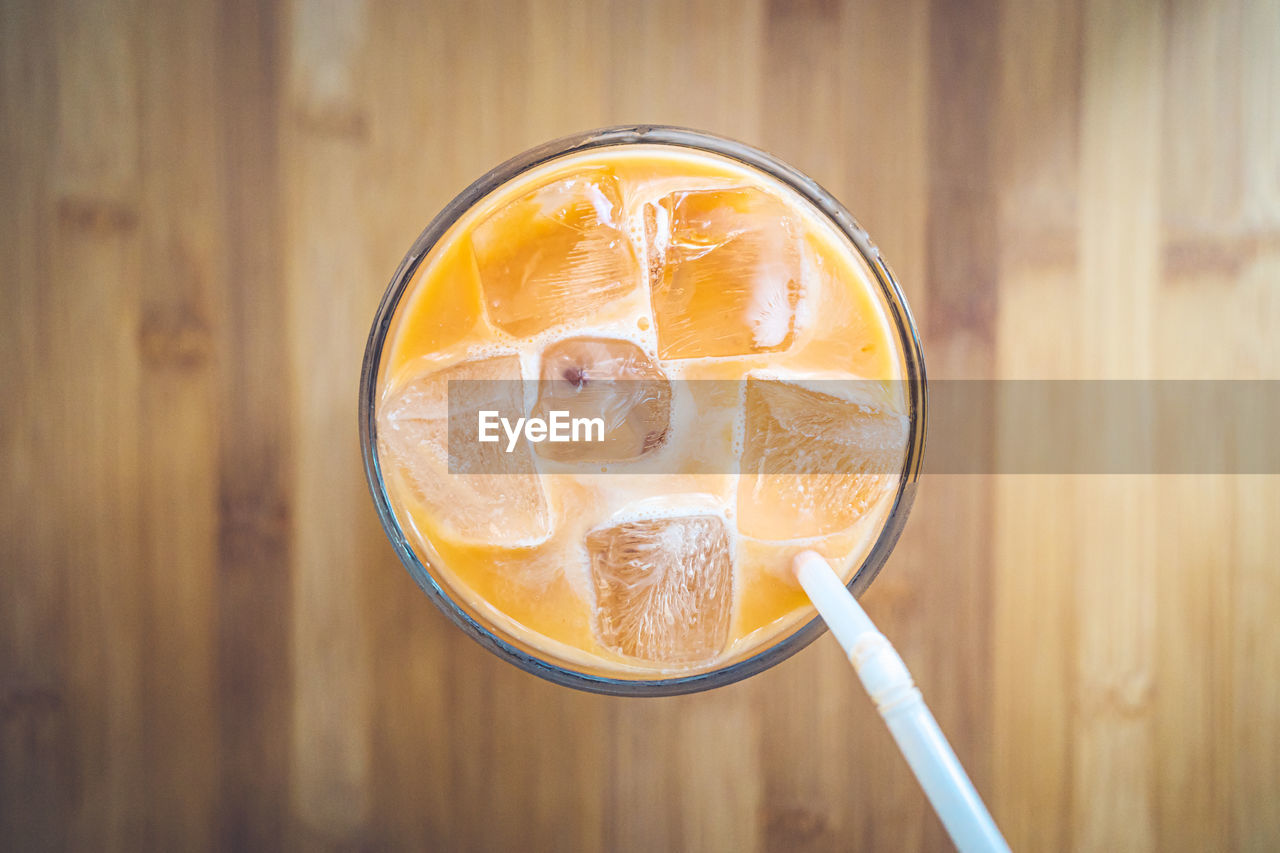 DIRECTLY ABOVE SHOT OF DRINK IN GLASS