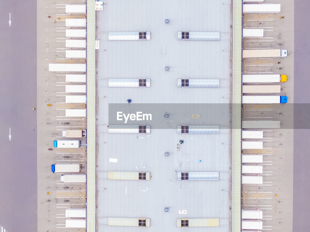 Aerial view of warehouse storages or industrial factory or logistics center from above. top view 