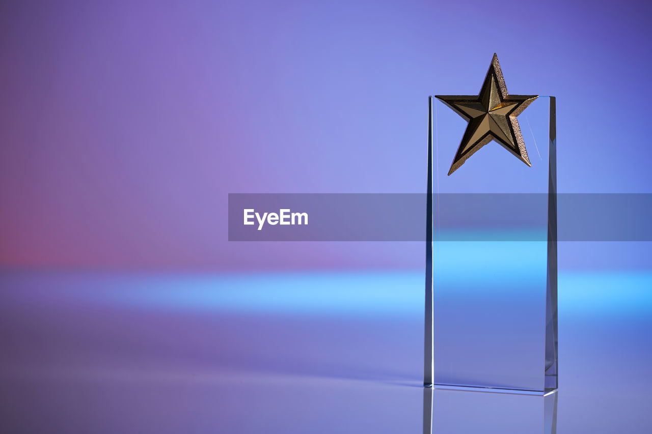 Close up of star shape crystal trophy