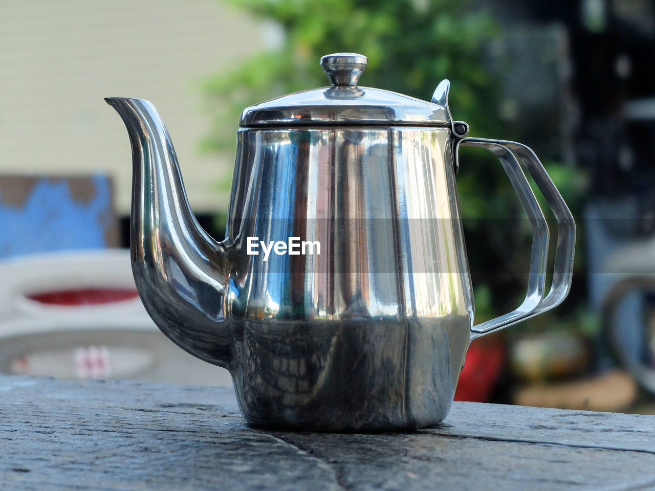 CLOSE-UP OF TEA IN CONTAINER ON TABLE